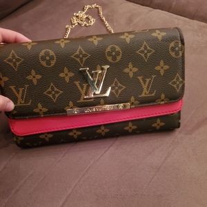 Louis Vuitton clutch shoulder bag